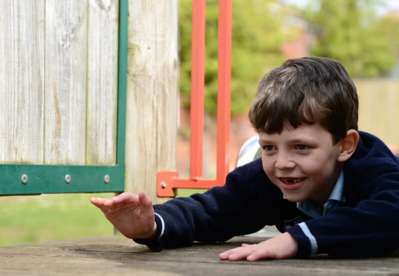 Pre-prep pupil playing